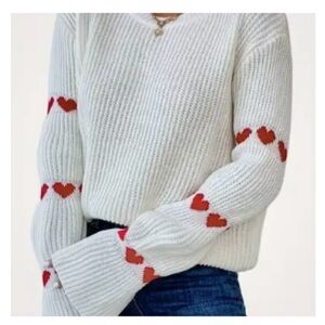 White Sweater with Red Heart Accents